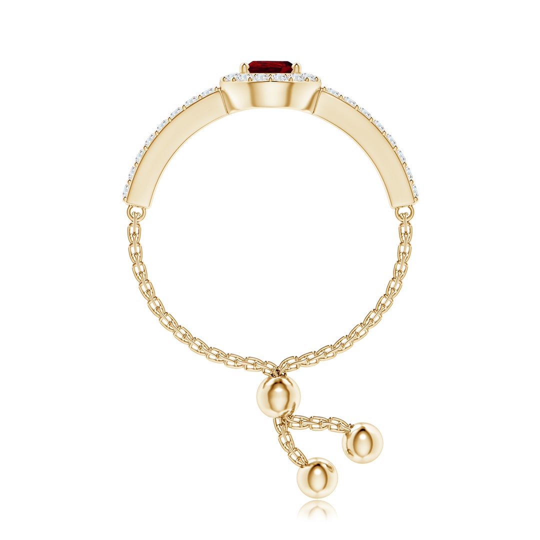 Floating Pear-Shaped Ruby Bolo Ring with Halo