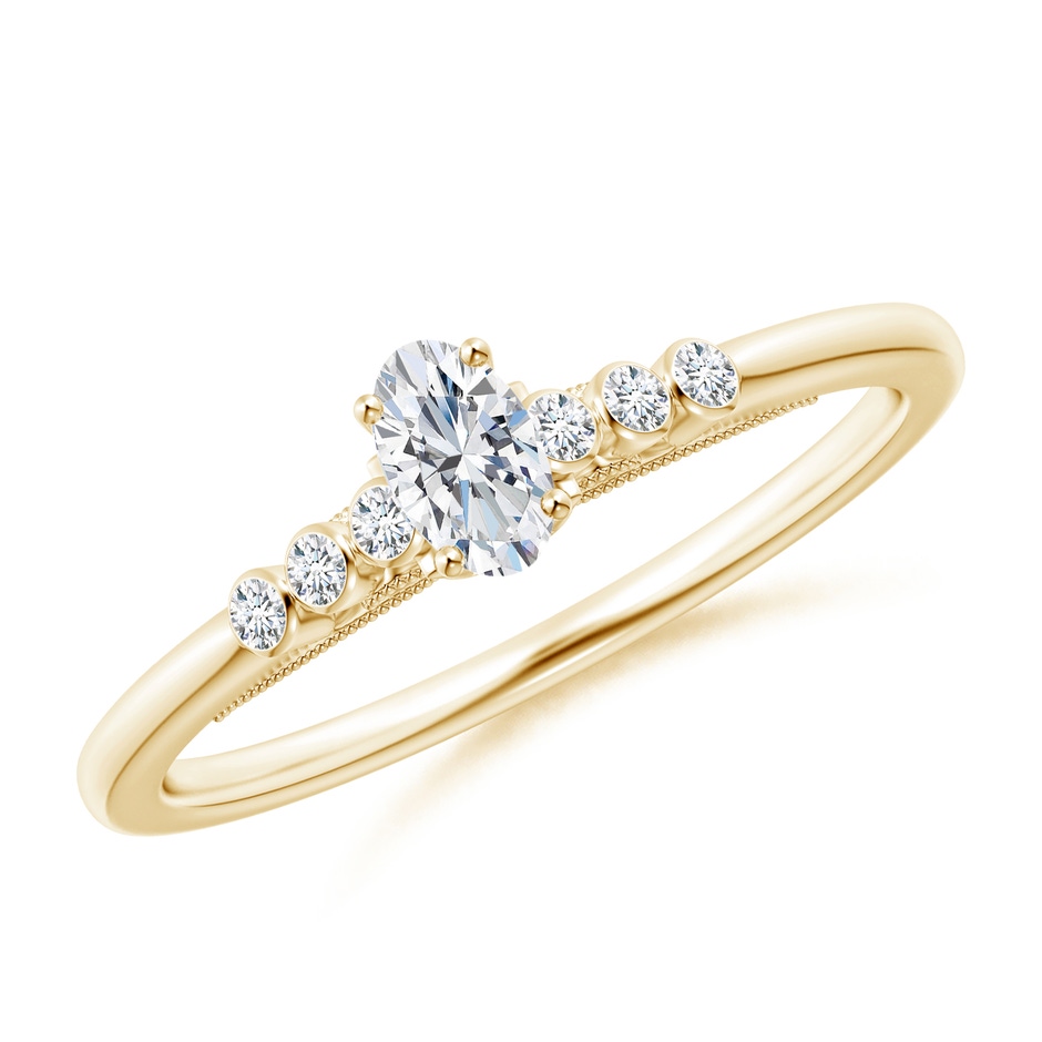 5x3mm GVS2 Oval Diamond Engagement Ring with Bezel-Set Accents in Yellow Gold 