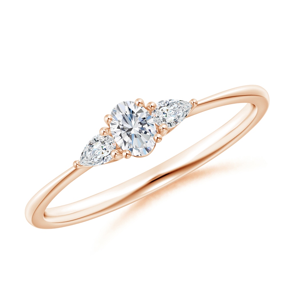 4x3mm GVS2 Oval and Pear-Shaped Diamond Three Stone Ring in Rose Gold