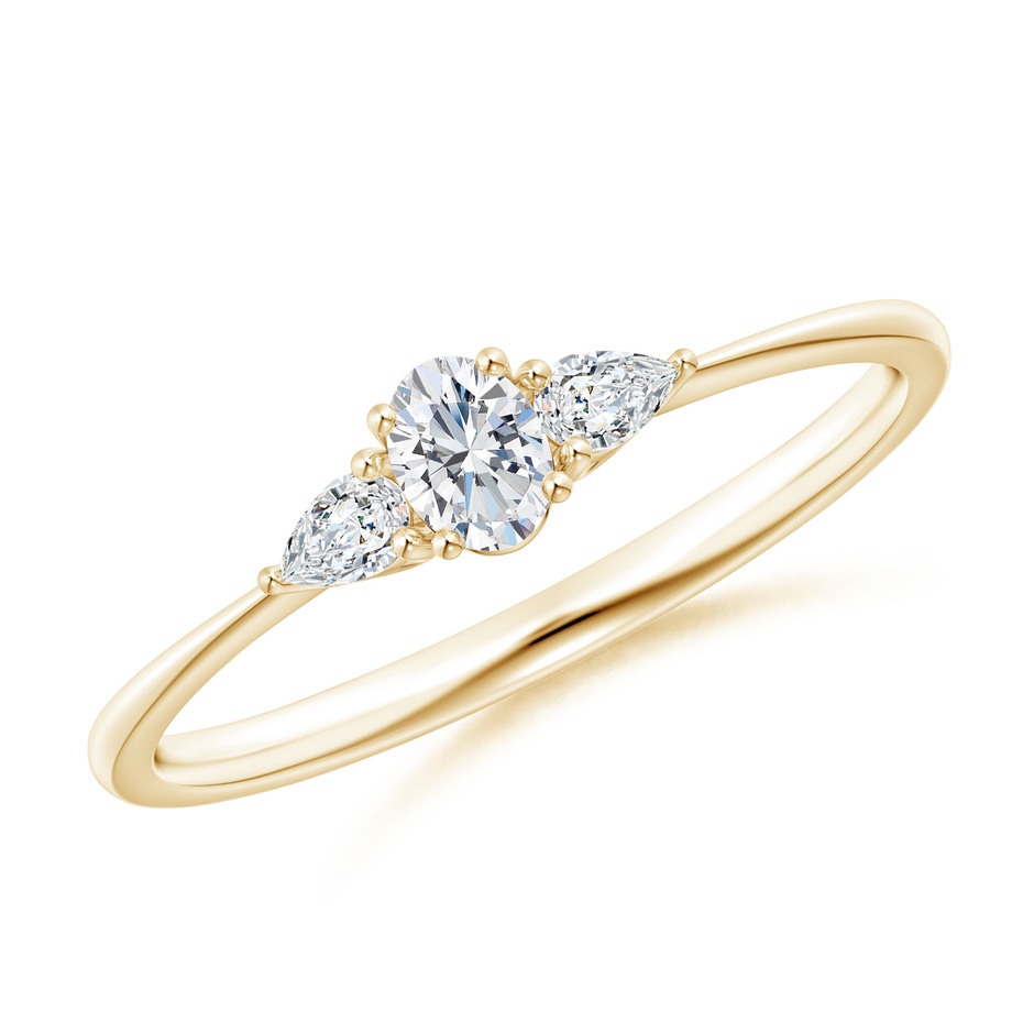 4x3mm GVS2 Oval and Pear-Shaped Diamond Three Stone Ring in Yellow Gold 