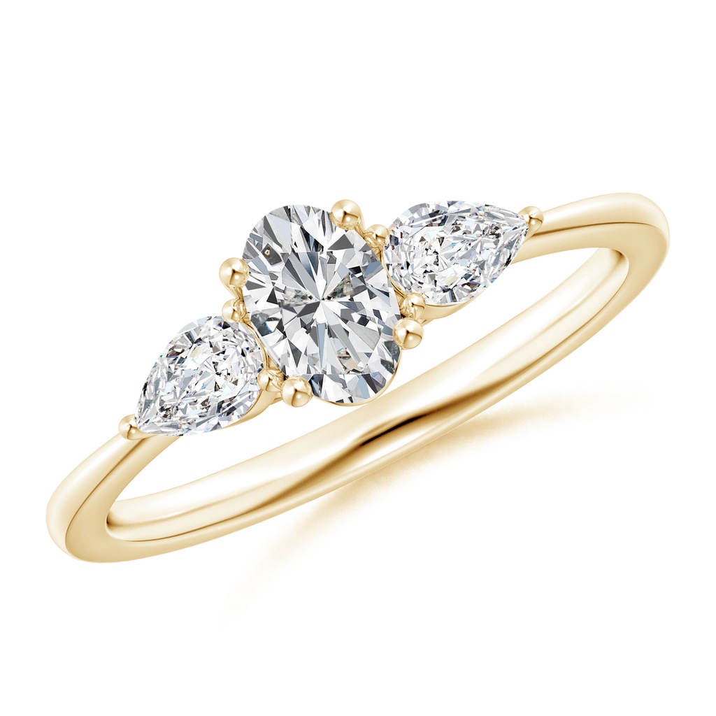 6x4mm HSI2 Oval and Pear-Shaped Diamond Three Stone Ring in Yellow Gold