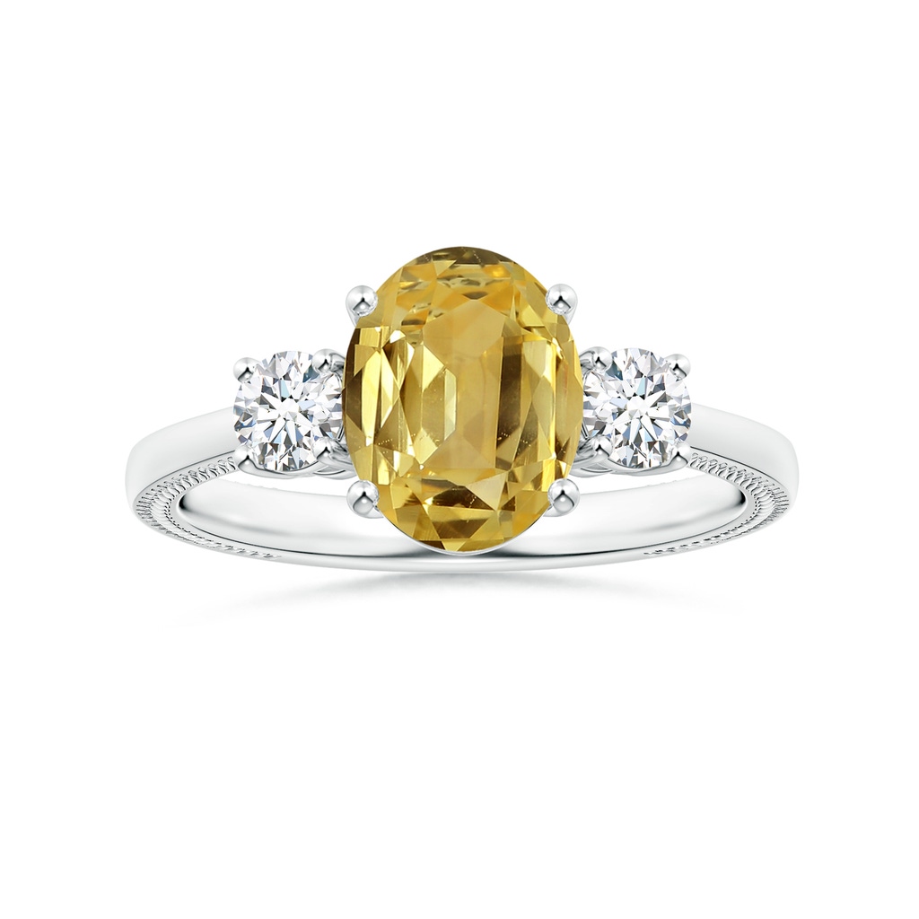 9.08x7.00x3.98mm AAAA Three Stone Oval Yellow Sapphire Ring with Reverse Tapered Leaf Shank in White Gold 