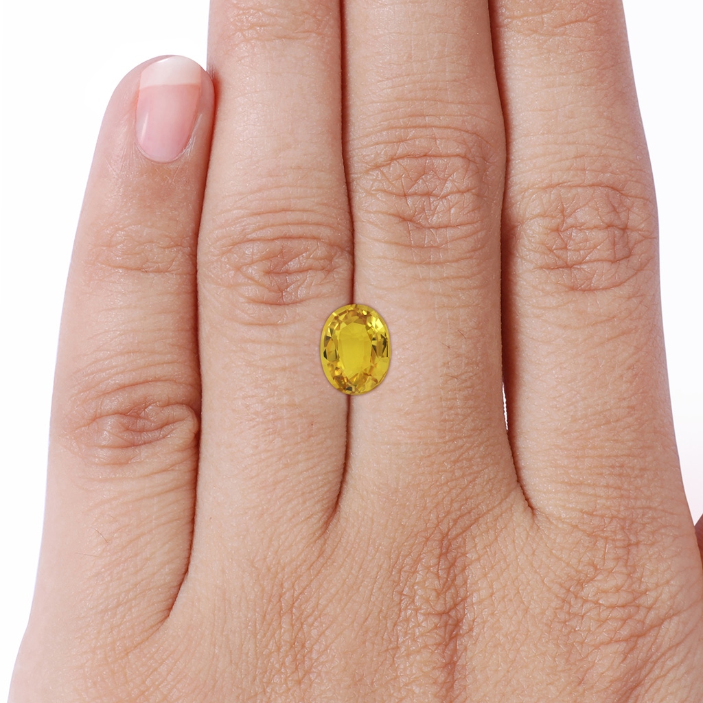 9.08x7.00x3.98mm AAAA Three Stone Oval Yellow Sapphire Ring with Reverse Tapered Leaf Shank in White Gold Side 799