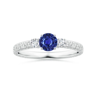 4.99x4.96x2.93mm AAA GIA Certified Round Sapphire Three Stone Ring with Scrollwork in P950 Platinum