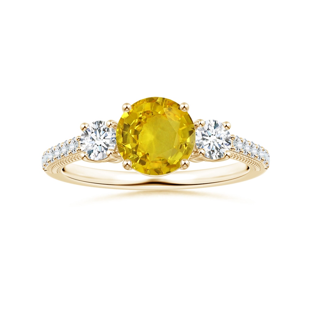6.97-7.01-4.98mm AAA Yellow Sapphire Three Stone Ring with Leaf Motifs in Yellow Gold