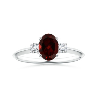 8.16x6.07x3.91mm AAA GIA Certified Three Stone Oval Garnet Knife-Edged Shank Ring in P950 Platinum
