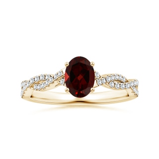 8.16x6.07x3.91mm AAA Prong-Set GIA Certified Oval Garnet Twisted Shank Ring with Diamonds in 10K Yellow Gold