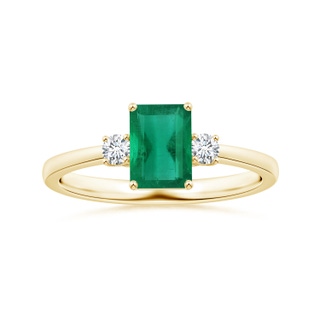 7.12x5.09x3.31mm AA GIA Certified Emerald-Cut Emerald Three Stone Ring with Reverse Tapered Shank in 18K Yellow Gold