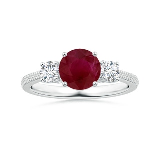 6.93x6.78x3.67mm A Three Stone Round Ruby Reverse Tapered Shank Ring with Feather Motifs in P950 Platinum