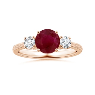 6.93x6.78x3.67mm A Three Stone Round Ruby Reverse Tapered Shank Ring with Feather Motifs in Rose Gold