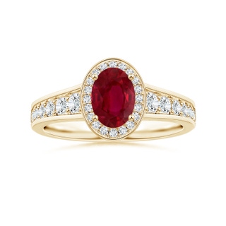 6.04x3.95x1.86mm AA Oval Ruby Tapered Shank Ring with Diamond Halo in 9K Yellow Gold