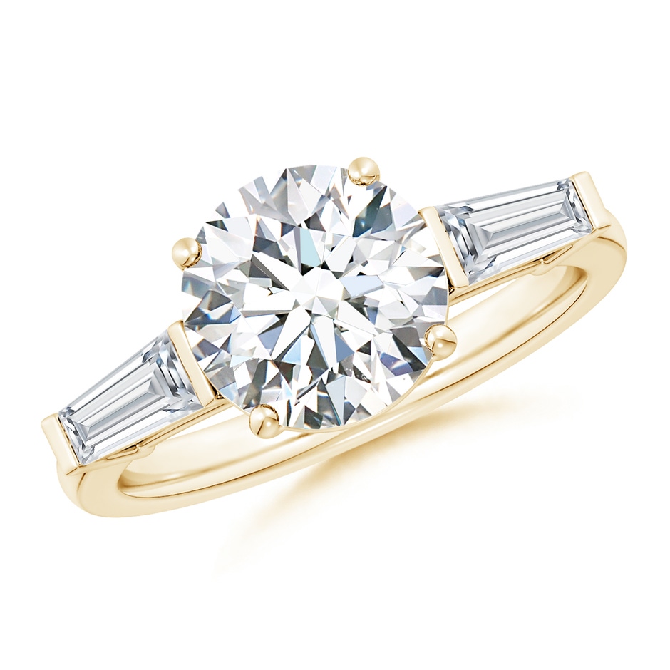 9.2mm GVS2 Round and Tapered Baguette Diamond Side Stone Engagement Ring in Yellow Gold 