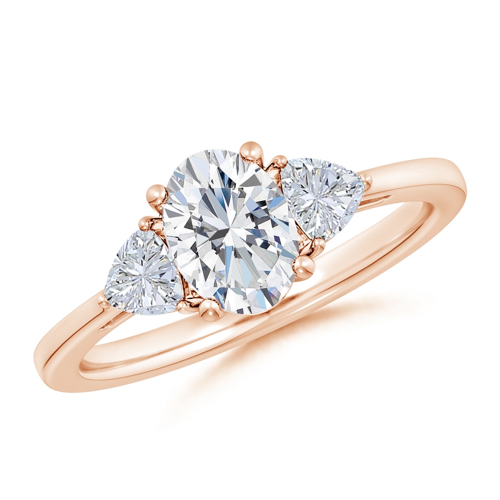 7.7x5.7mm GVS2 Oval and Trillion Diamond Three Stone Reverse Tapered Shank Engagement Ring in 10K Rose Gold 