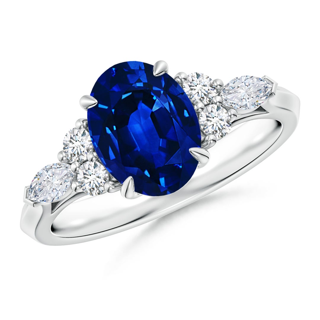 9x7mm AAAA Oval Blue Sapphire Side Stone Engagement Ring with Diamonds in White Gold