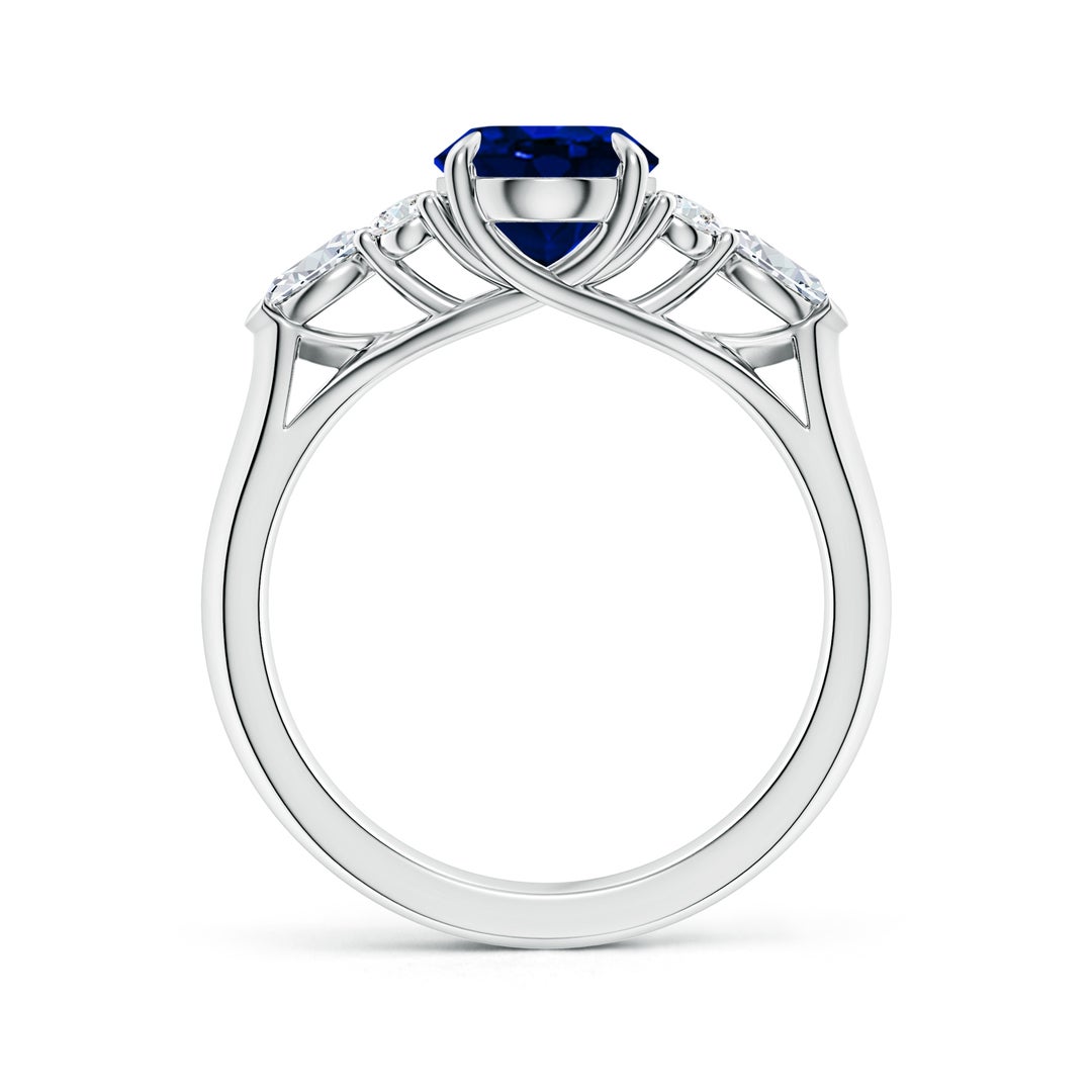 9x7mm AAAA Oval Blue Sapphire Side Stone Engagement Ring with Diamonds in White Gold - side 2