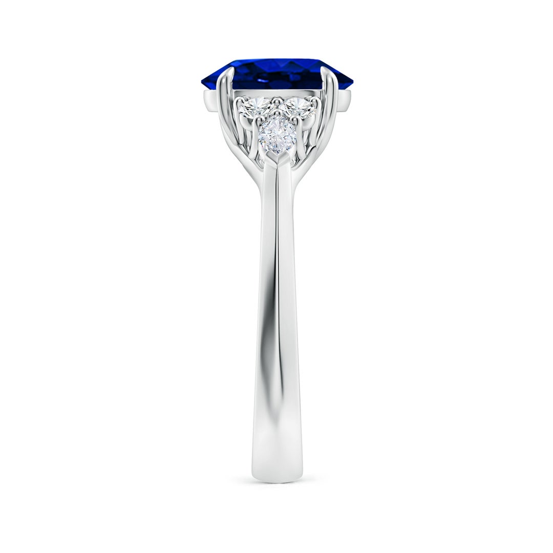 9x7mm AAAA Oval Blue Sapphire Side Stone Engagement Ring with Diamonds in White Gold - side 3