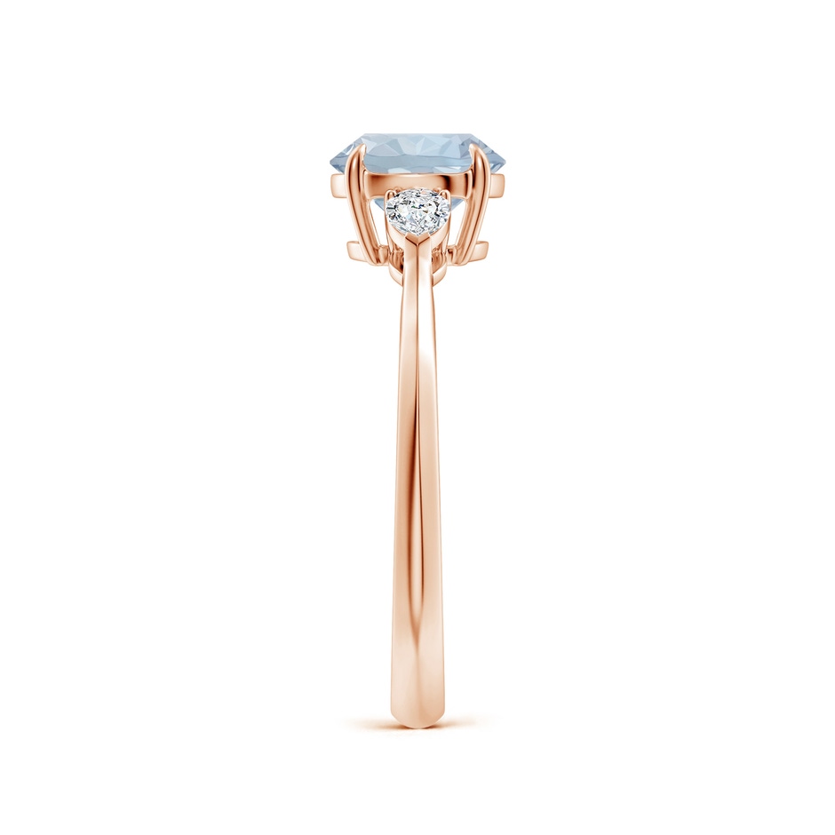 7mm A Round Aquamarine and Pear Diamond Three Stone Engagement Ring in Rose Gold side 299