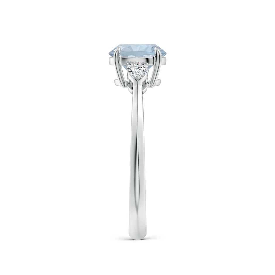 7mm A Round Aquamarine and Pear Diamond Three Stone Engagement Ring in White Gold side 299