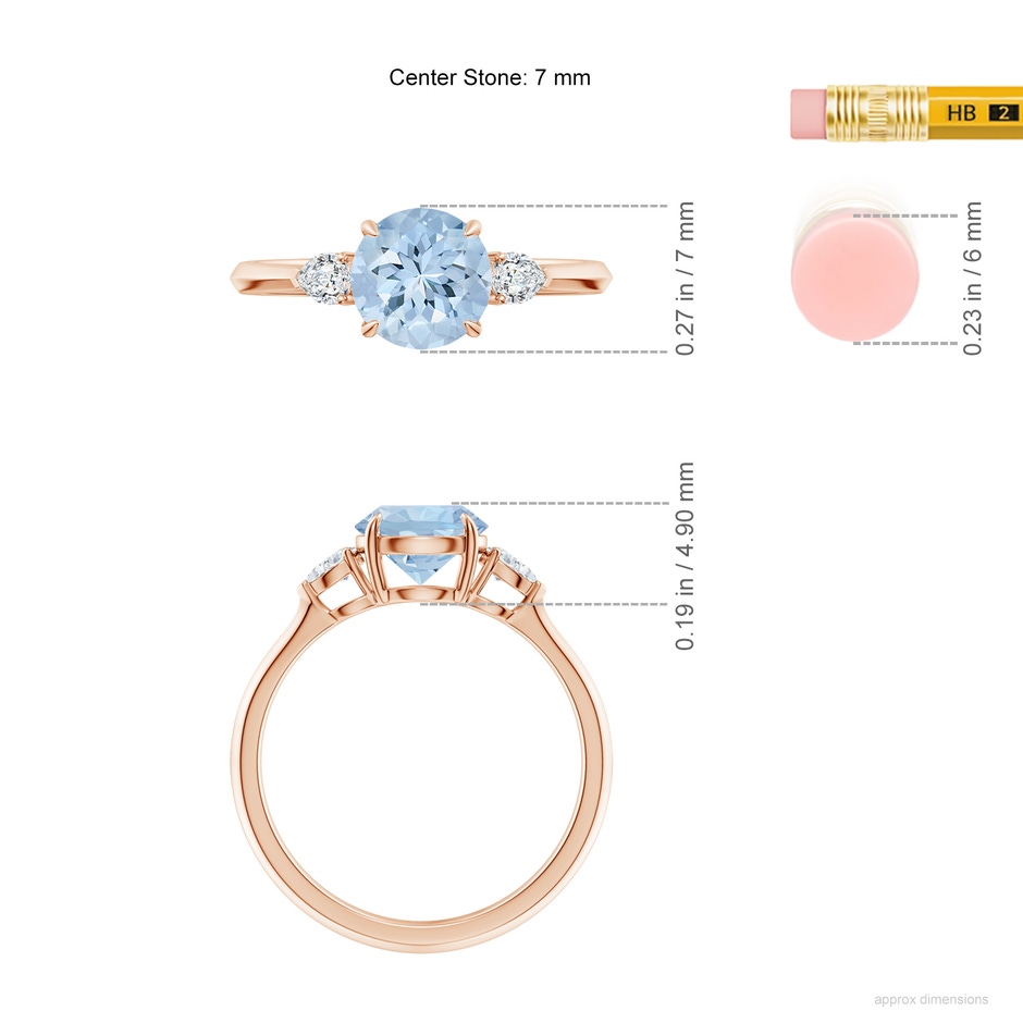 7mm AA Round Aquamarine and Pear Diamond Three Stone Engagement Ring in Rose Gold ruler
