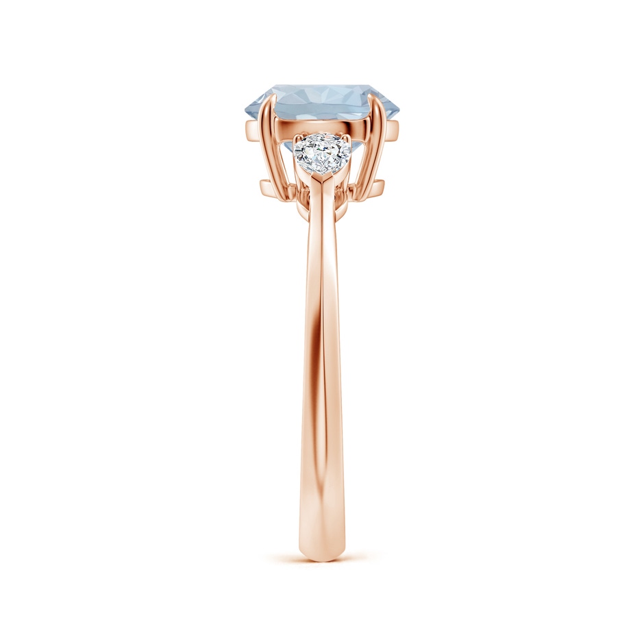 8mm A Round Aquamarine and Pear Diamond Three Stone Engagement Ring in Rose Gold side 299