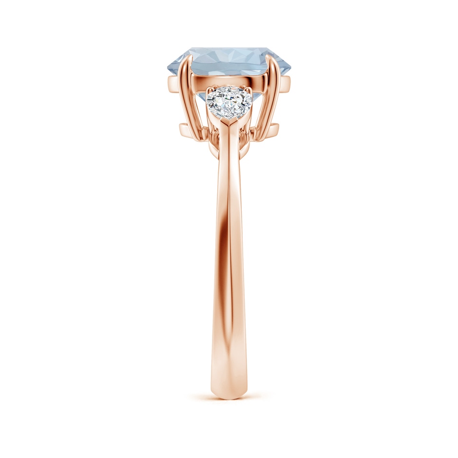 9mm A Round Aquamarine and Pear Diamond Three Stone Engagement Ring in Rose Gold side 299