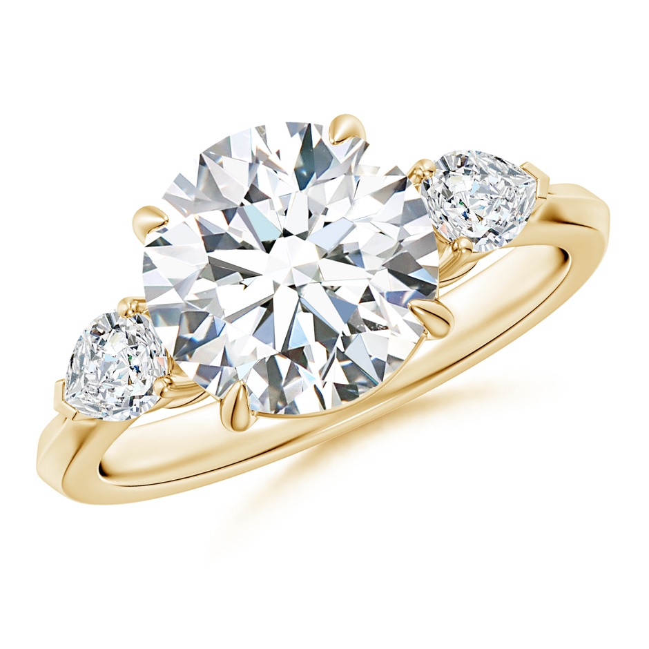 9.2mm GVS2 Round and Pear Diamond Three Stone Engagement Ring in Yellow Gold 