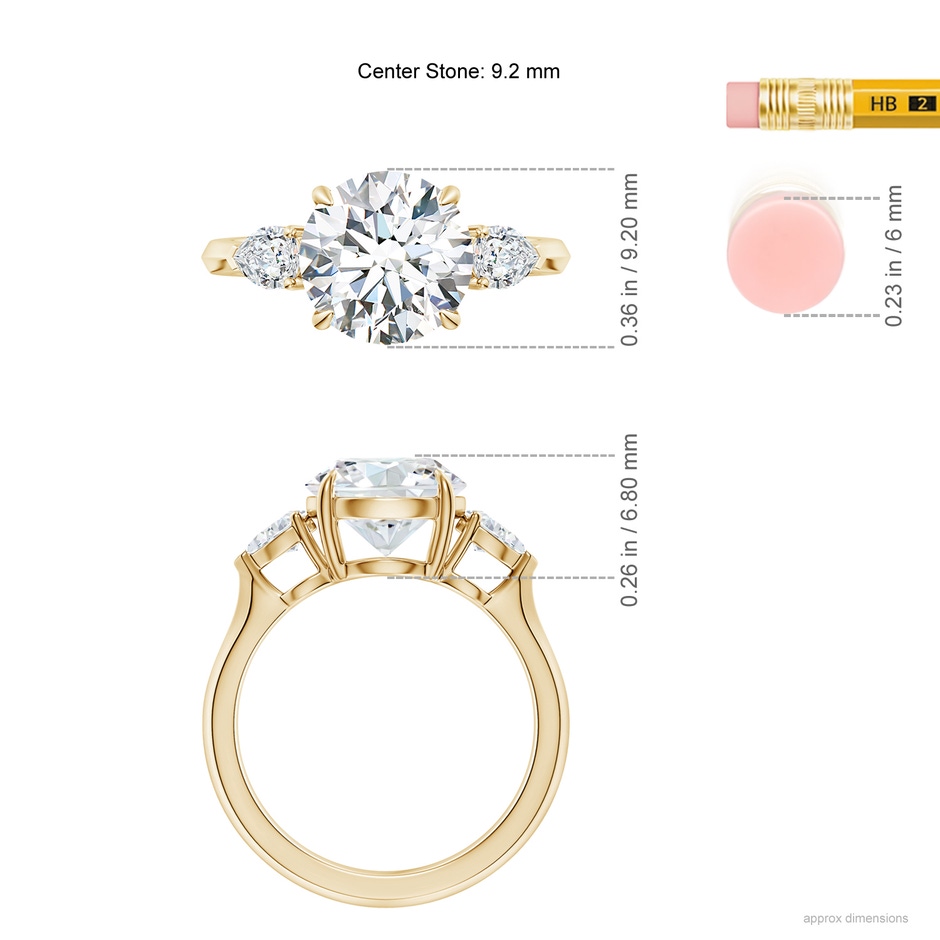 9.2mm GVS2 Round and Pear Diamond Three Stone Engagement Ring in Yellow Gold ruler