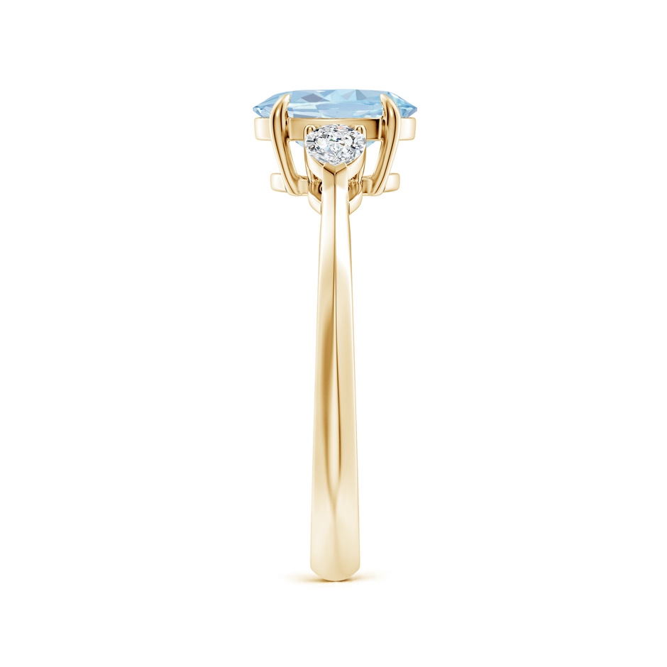 8x6mm A Oval Aquamarine and Pear Diamond Three Stone Engagement Ring in Yellow Gold side 299