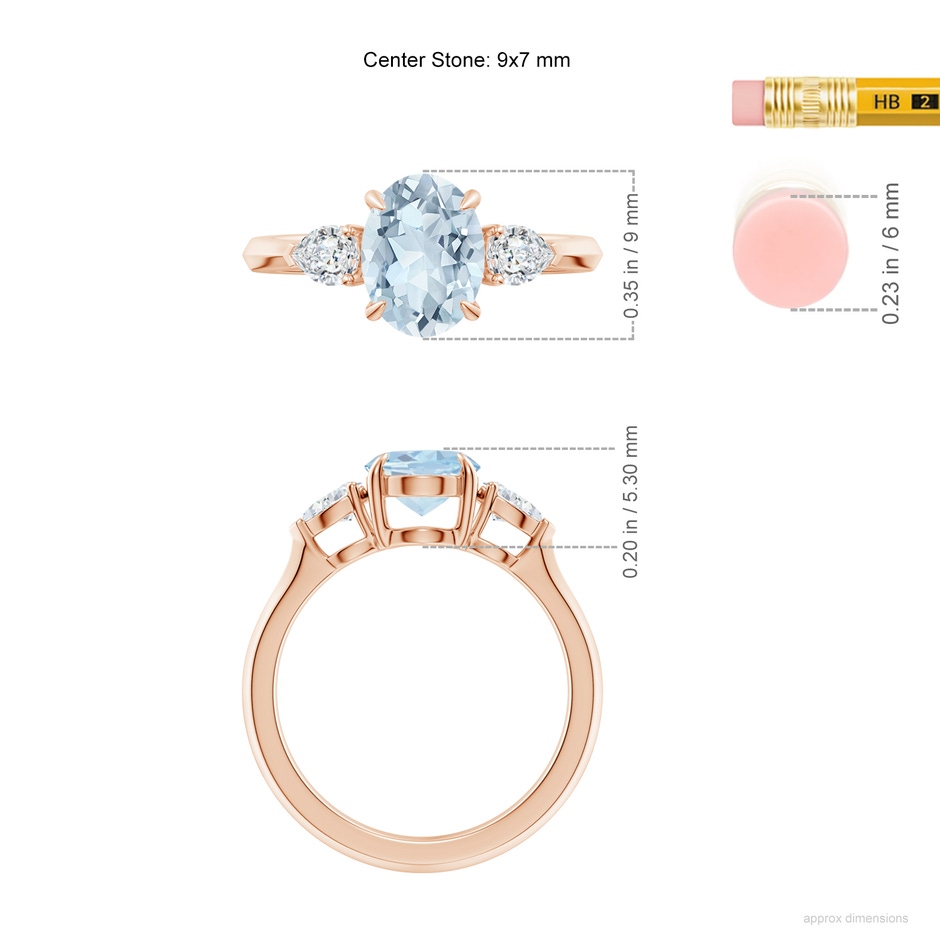 9x7mm A Oval Aquamarine and Pear Diamond Three Stone Engagement Ring in Rose Gold ruler