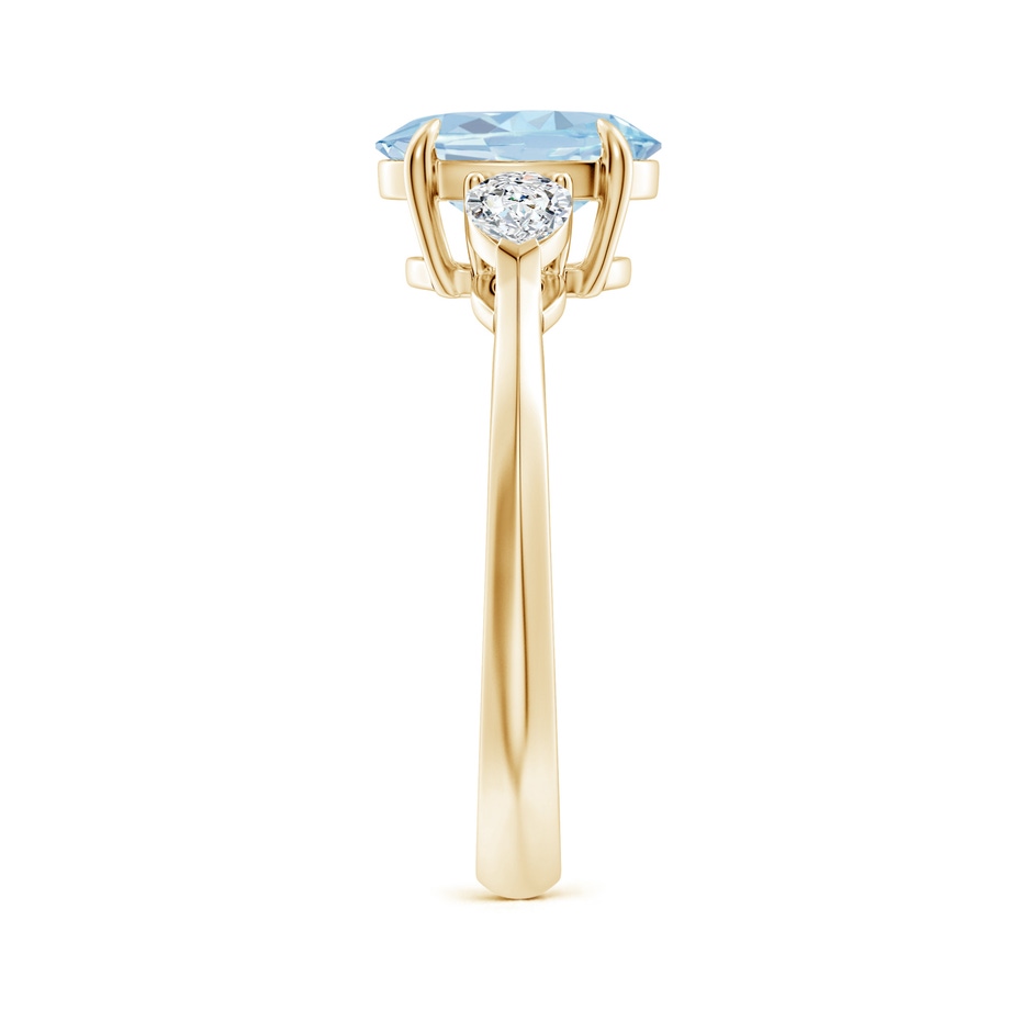 9x7mm A Oval Aquamarine and Pear Diamond Three Stone Engagement Ring in Yellow Gold side 299