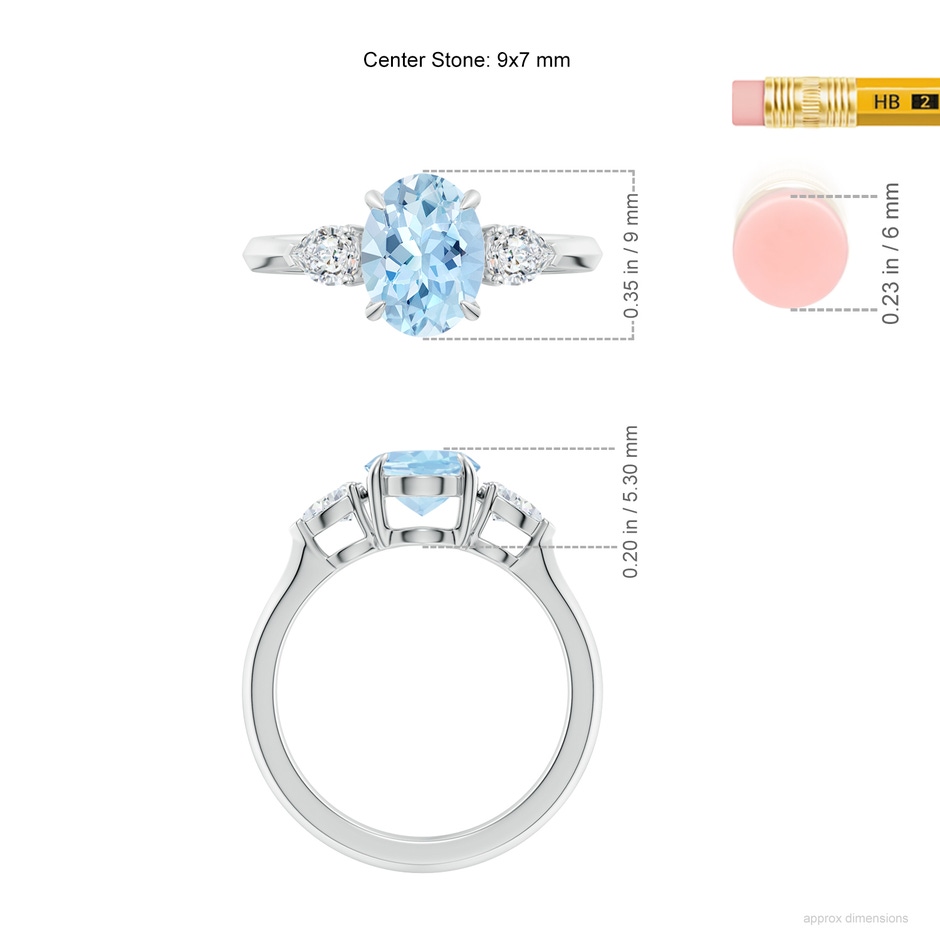 9x7mm AAA Oval Aquamarine and Pear Diamond Three Stone Engagement Ring in White Gold ruler