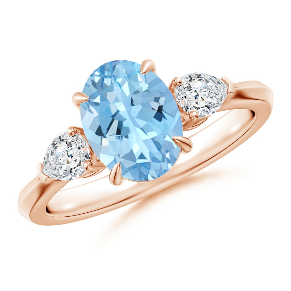 9x7mm AAAA Oval Aquamarine and Pear Diamond Three Stone Engagement Ring in Rose Gold 