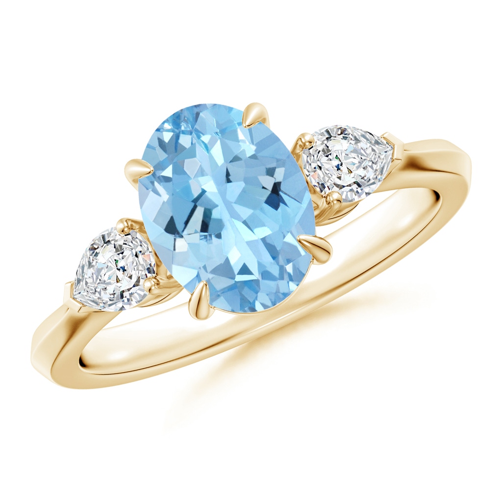 9x7mm AAAA Oval Aquamarine and Pear Diamond Three Stone Engagement Ring in Yellow Gold