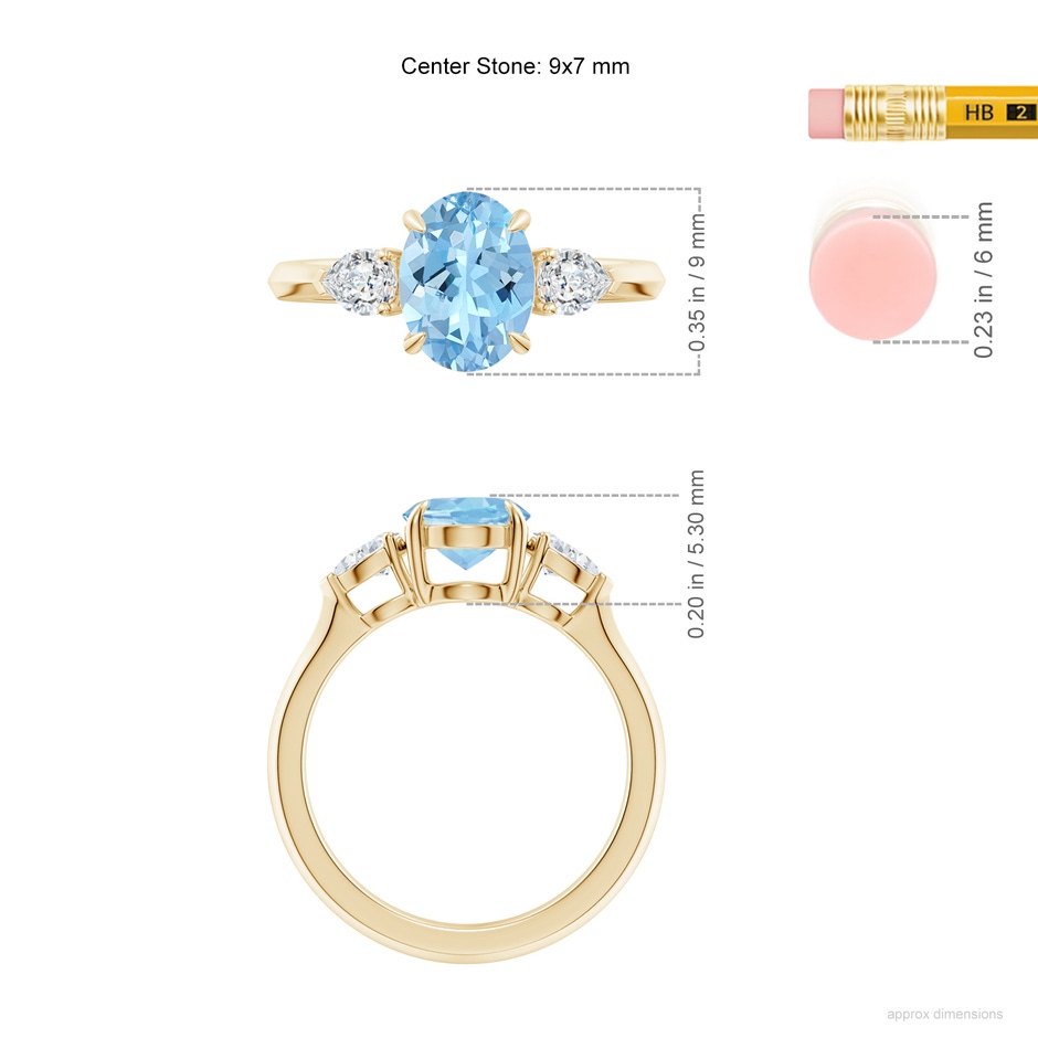 9x7mm AAAA Oval Aquamarine and Pear Diamond Three Stone Engagement Ring in Yellow Gold ruler