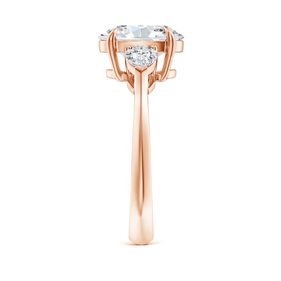 10x8mm GVS2 Oval Diamond and Pear Diamond Three Stone Engagement Ring in Rose Gold side 299