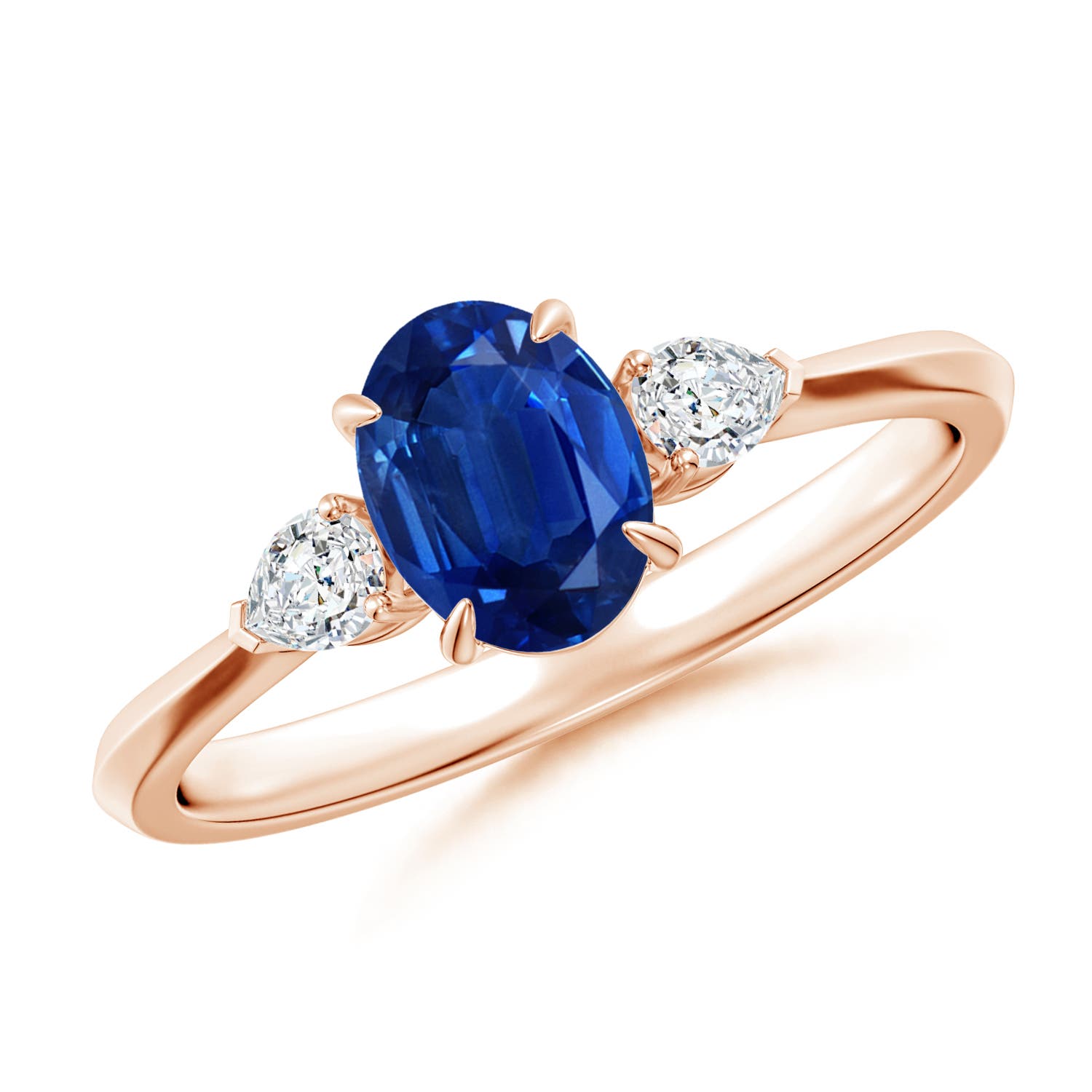 7x5mm AAA Oval Blue Sapphire and Pear Diamond Three Stone Engagement Ring in 18K Rose Gold