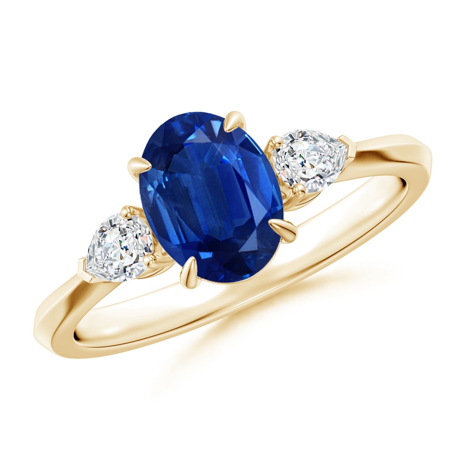 8x6mm AAA Oval Blue Sapphire and Pear Diamond Three Stone Engagement Ring in Yellow Gold 