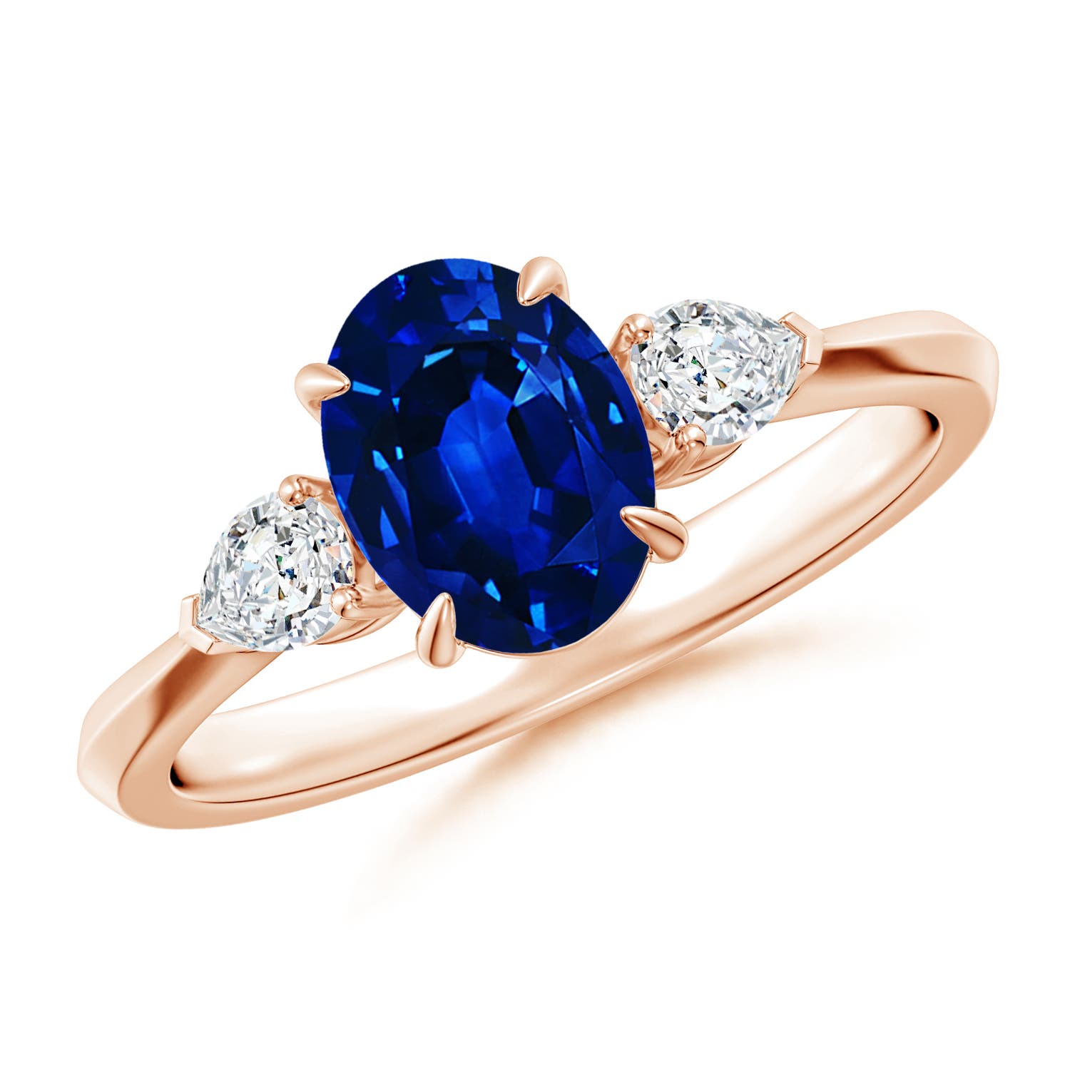 8x6mm AAAA Oval Blue Sapphire and Pear Diamond Three Stone Engagement Ring in Rose Gold
