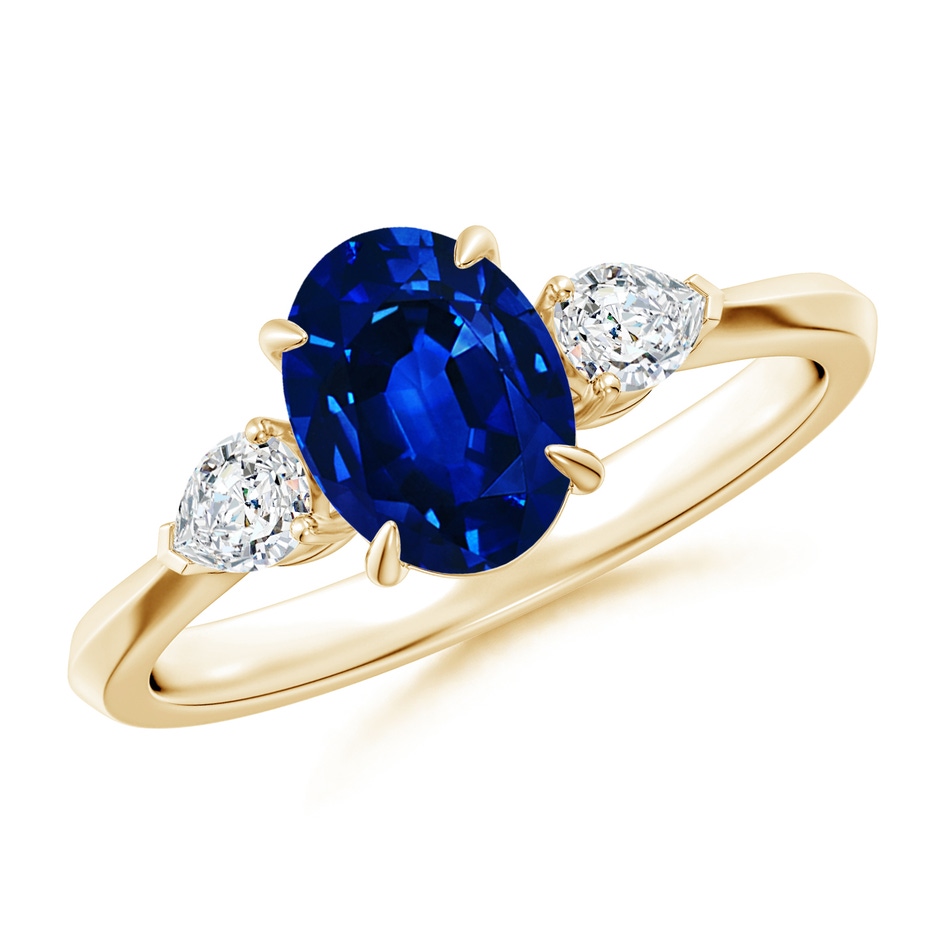 8x6mm AAAA Oval Blue Sapphire and Pear Diamond Three Stone Engagement Ring in Yellow Gold 