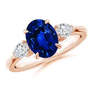 9x7mm AAAA Oval Blue Sapphire and Pear Diamond Three Stone Engagement Ring in Rose Gold