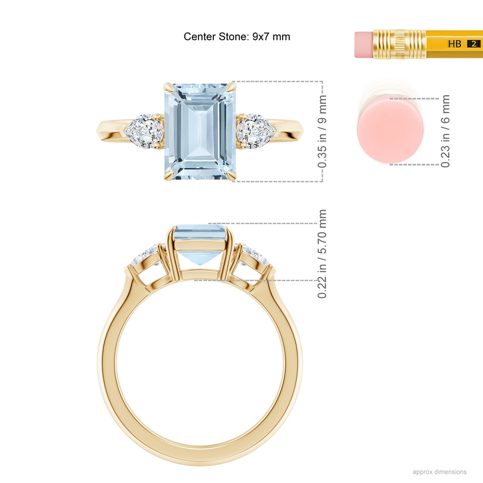 9x7mm A Emerald-Cut Aquamarine and Pear Diamond Three Stone Engagement Ring in Yellow Gold ruler