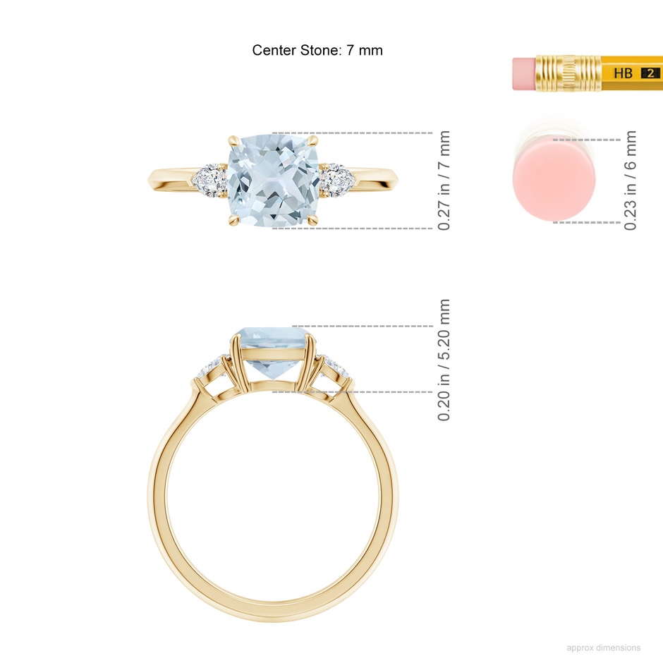 7mm A Cushion Aquamarine and Pear Diamond Three Stone Engagement Ring in Yellow Gold ruler