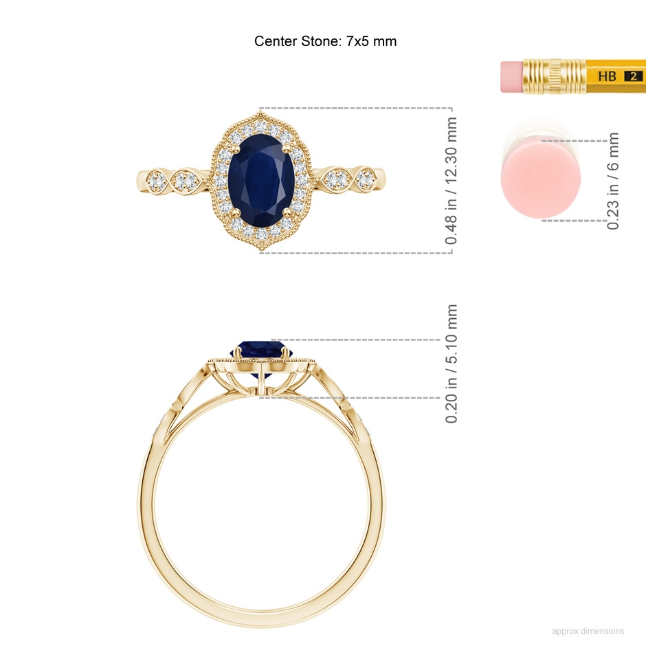 7x5mm A Vintage Inspired Oval Blue Sapphire Ornate Halo Engagement Ring in Yellow Gold ruler