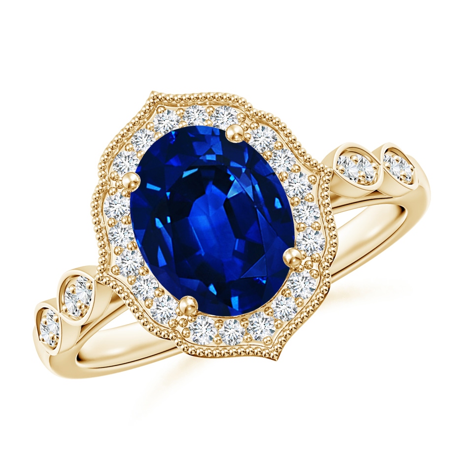 9x7mm AAAA Vintage Inspired Oval Blue Sapphire Ornate Halo Engagement Ring in Yellow Gold 