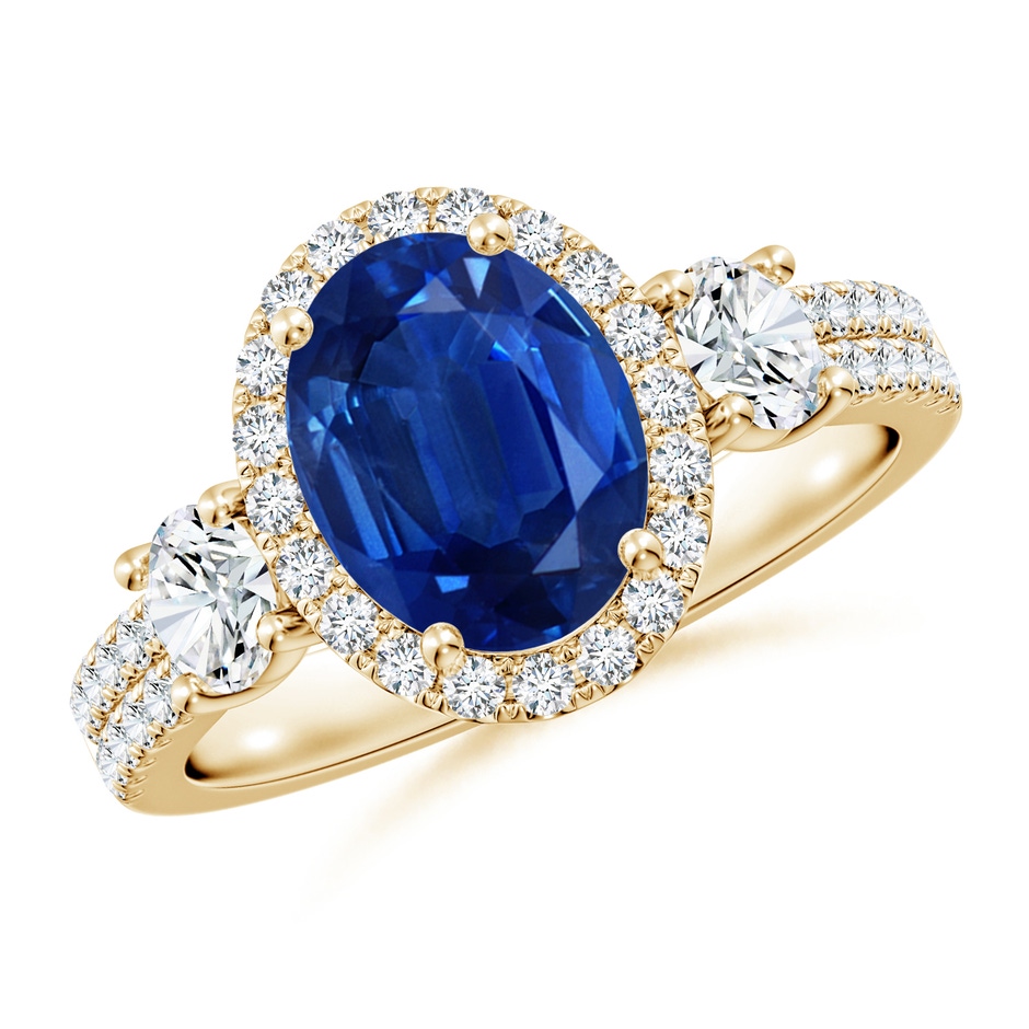 9x7mm AAA Oval Blue Sapphire Halo Double Shank Engagement Ring in Yellow Gold 