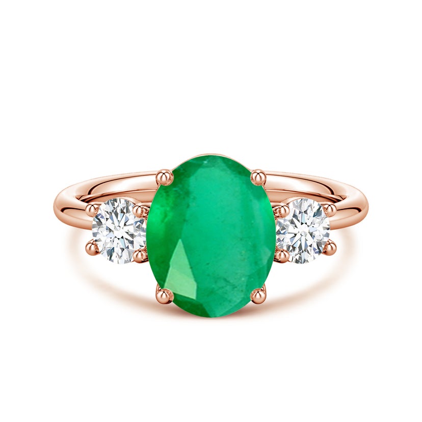 Oval Emerald and Round Diamond Three-Stone Engagement Ring