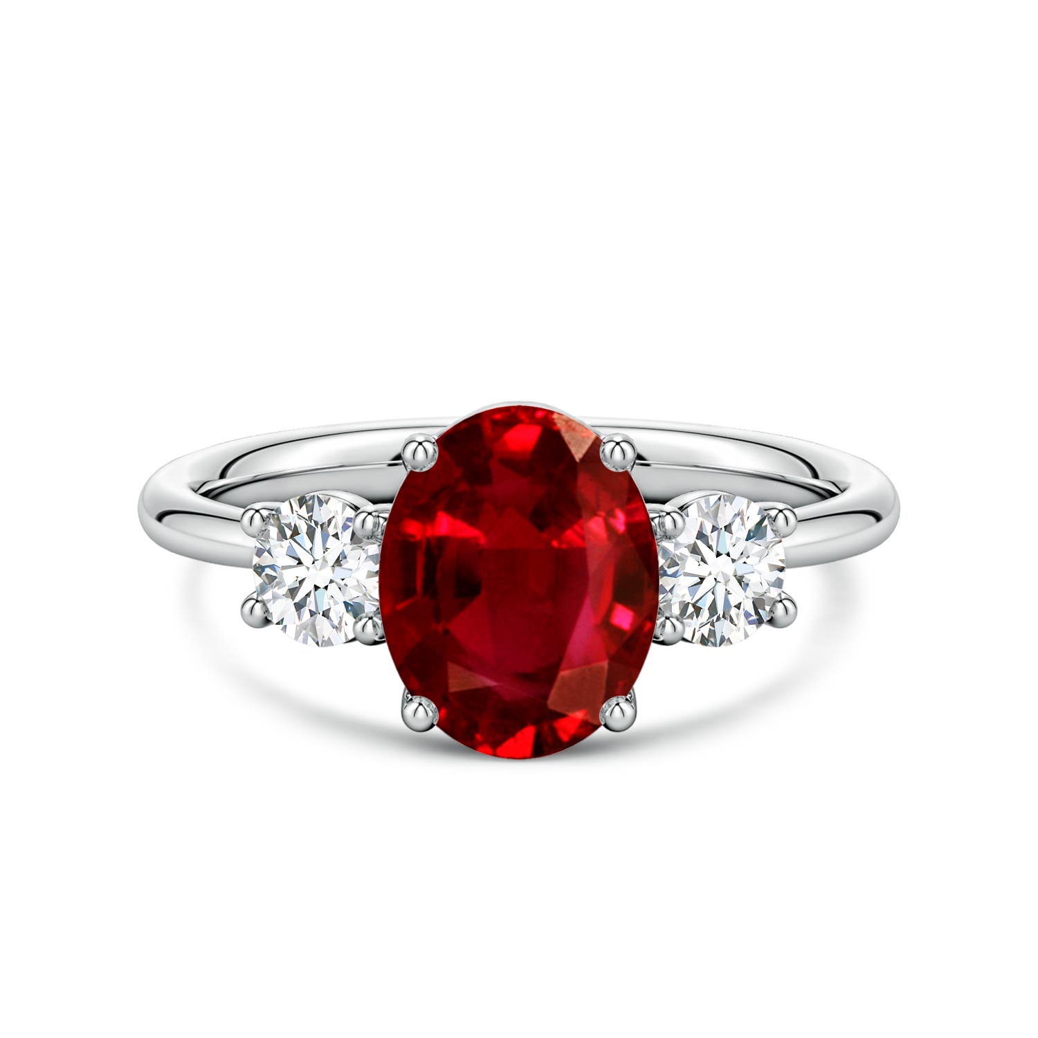 9x7mm AAAA Oval Ruby and Round Diamond Three-Stone Engagement Ring in White Gold