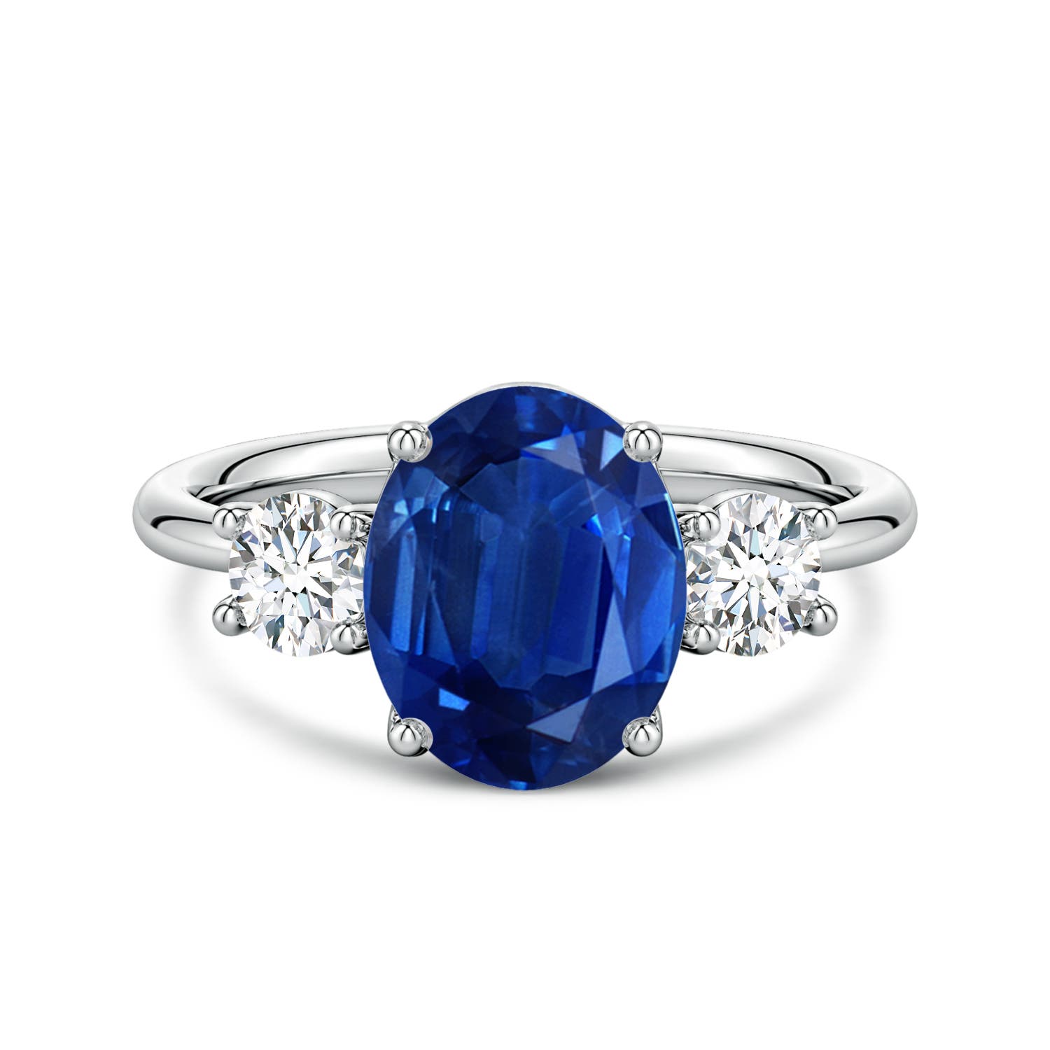 10x8mm AAA Oval Blue Sapphire and Round Diamond Three-Stone Engagement Ring in 18CT White Gold