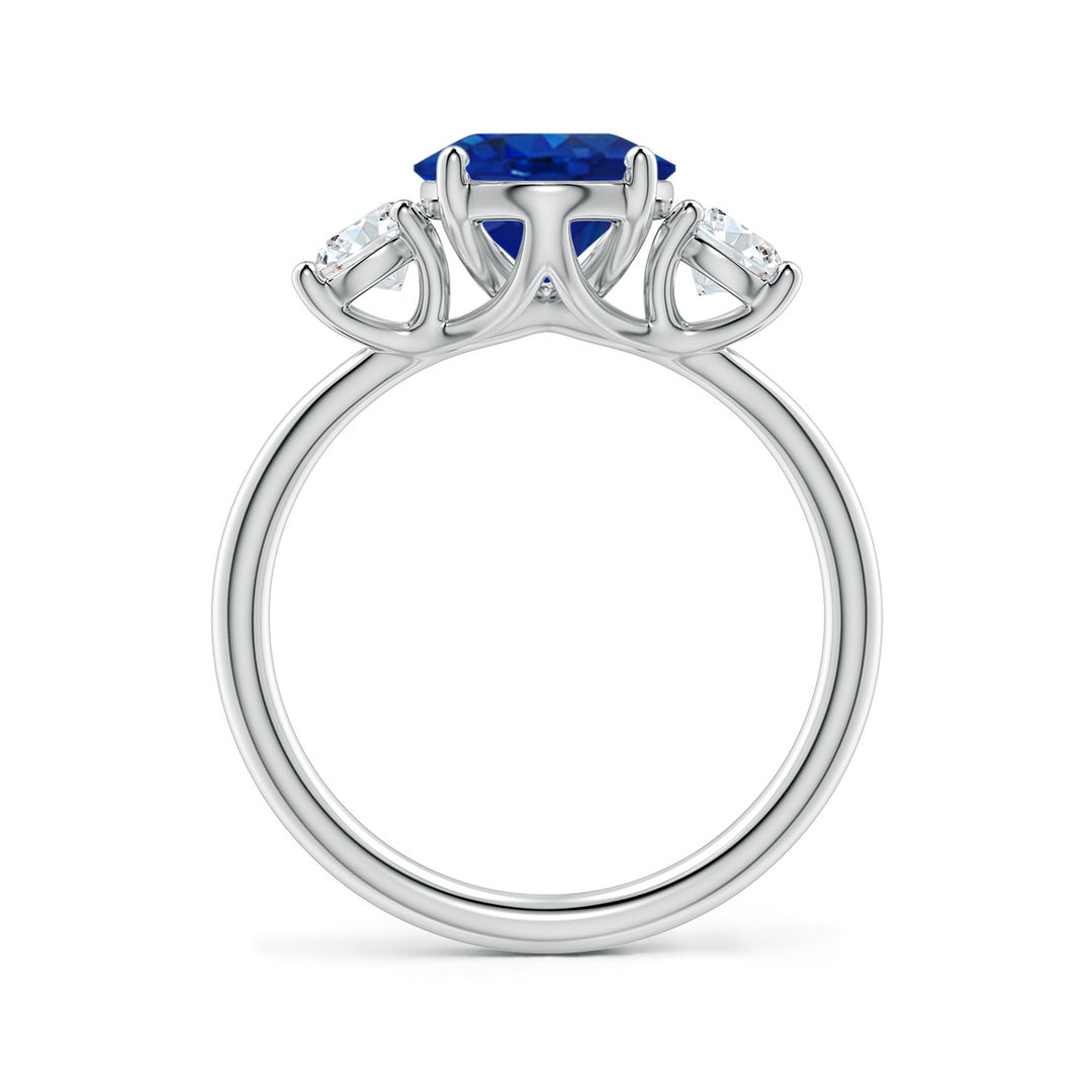 10x8mm AAA Oval Blue Sapphire and Round Diamond Three-Stone Engagement Ring in White Gold - side 2