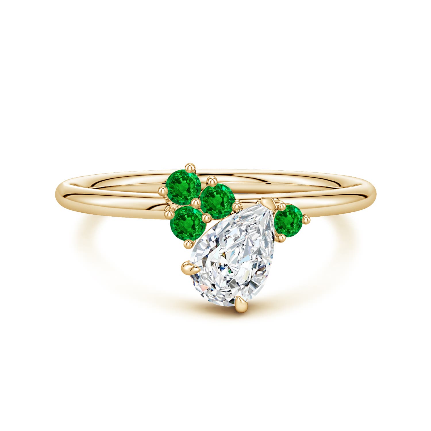7x5mm GVS2 Off-Centered Pear Diamond Engagement Ring with Scattered Emeralds in Yellow Gold